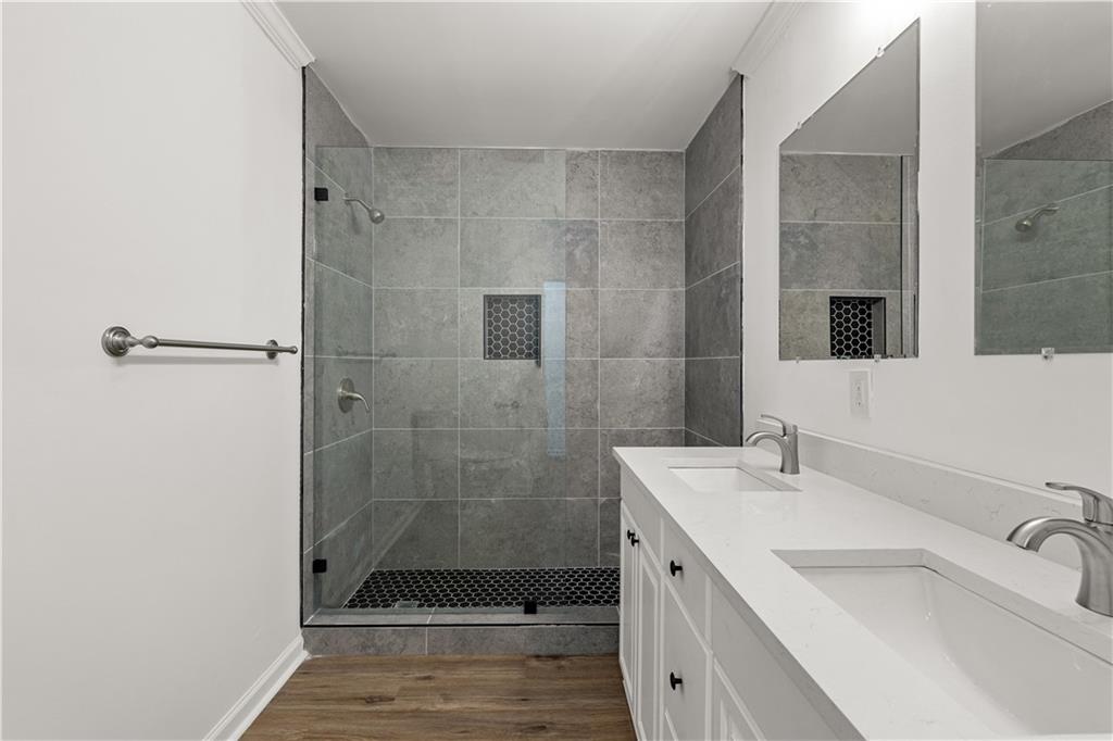 5302 Greenway Drive Villa Rica, GA 30180 - Photo 26 of 79 a bathroom with a sink a toilet and shower