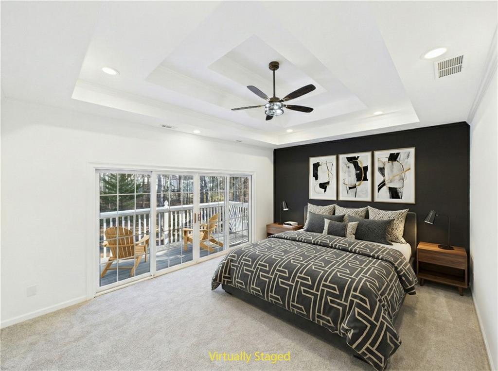 5302 Greenway Drive Villa Rica, GA 30180 - Photo 29 of 79 a bedroom with a large bed and a large window