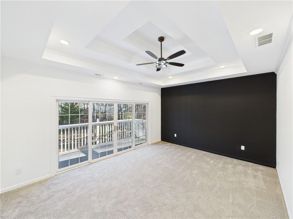 5302 Greenway Drive Villa Rica, GA 30180 - Photo 32 of 81 a view of a livingroom with a ceiling fan and window