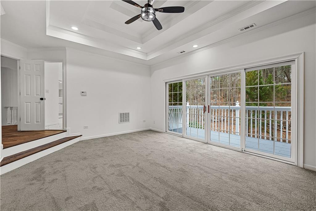 5302 Greenway Drive Villa Rica, GA 30180 - Photo 34 of 81 a view of a livingroom with a ceiling fan and window