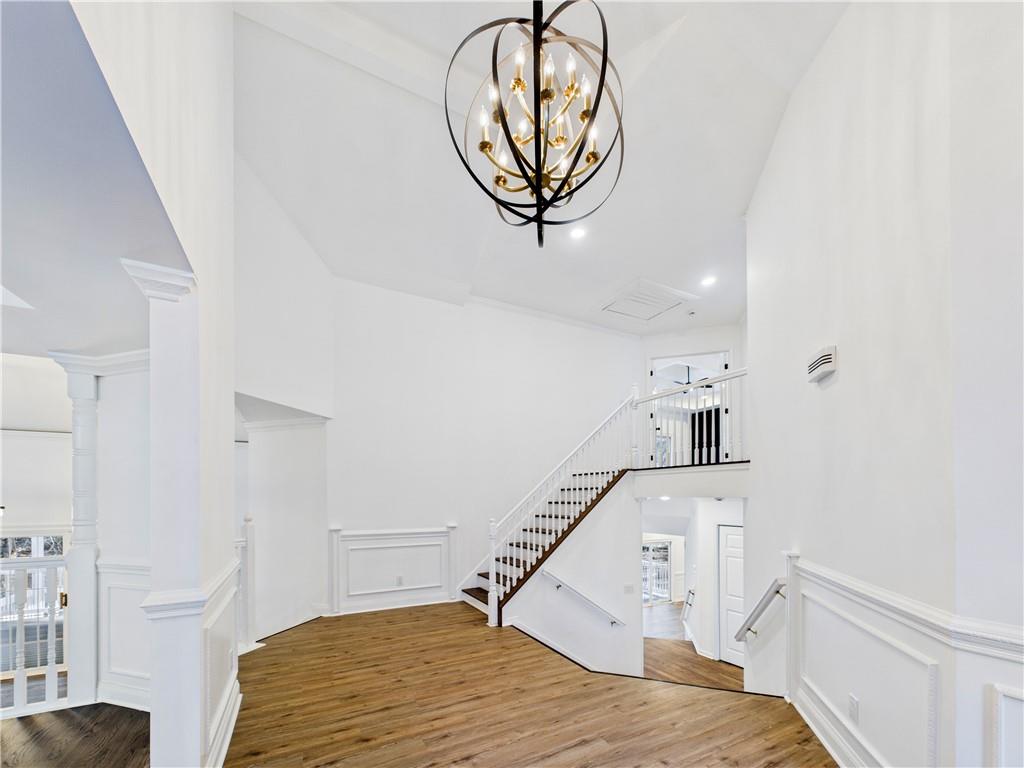 5302 Greenway Drive Villa Rica, GA 30180 - Photo 4 of 79 a view of a livingroom with wooden floor and a hallway