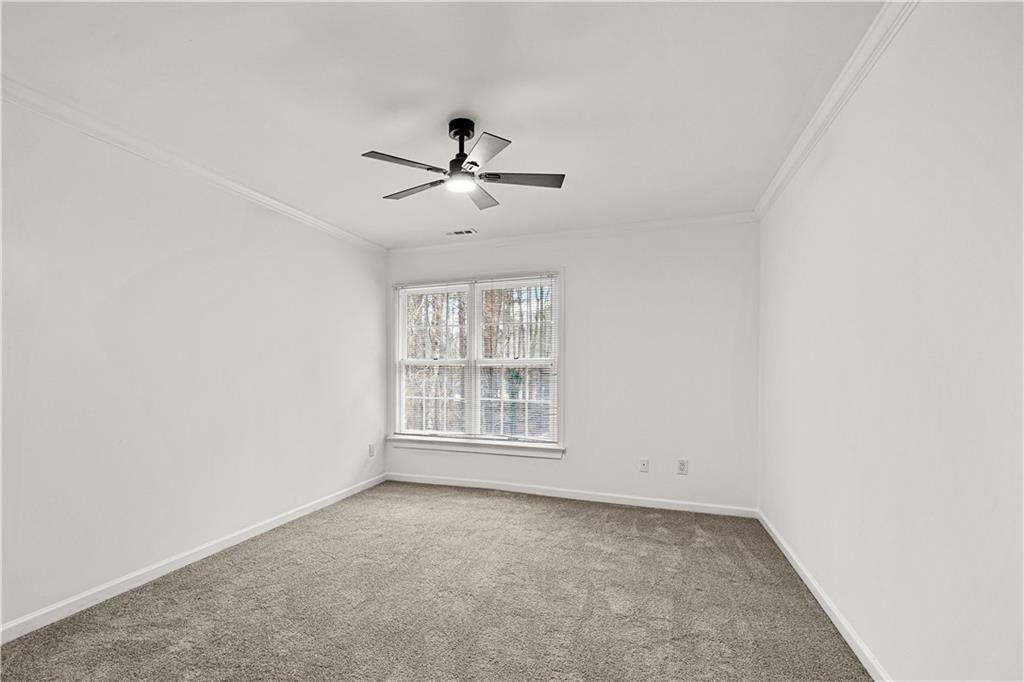 5302 Greenway Drive Villa Rica, GA 30180 - Photo 42 of 81 a view of an empty room with a window