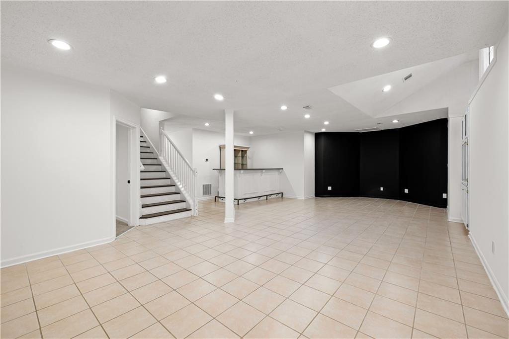 5302 Greenway Drive Villa Rica, GA 30180 - Photo 50 of 81 a view of an empty room with wooden floor