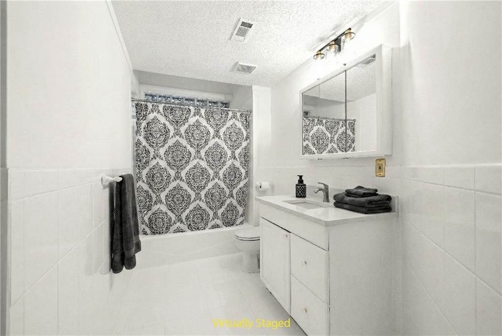 5302 Greenway Drive Villa Rica, GA 30180 - Photo 57 of 81 a bathroom with a sink toilet and shower