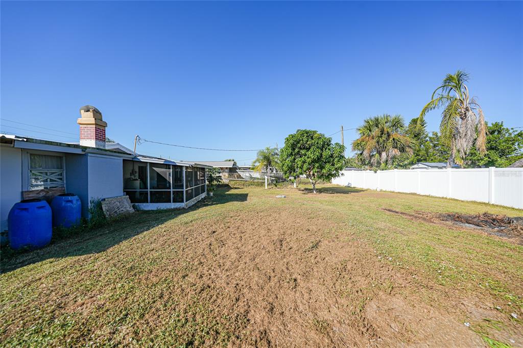 2930 Acline Road Punta Gorda, FL 33950 - Photo 26 of 29 a view of a backyard of the house