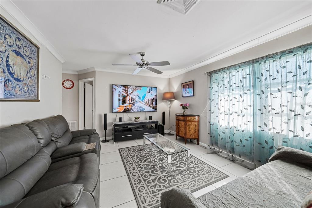 2930 Acline Road Punta Gorda, FL 33950 - Photo 3 of 29 a living room with furniture and a fireplace