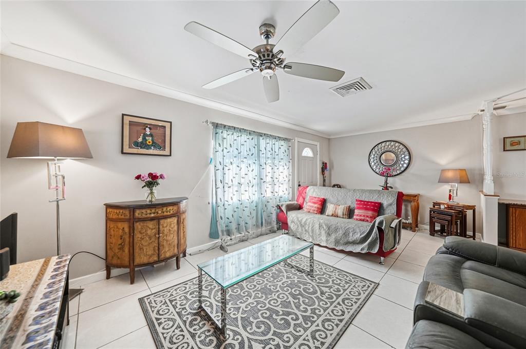 2930 Acline Road Punta Gorda, FL 33950 - Photo 4 of 29 a living room with furniture and a large window