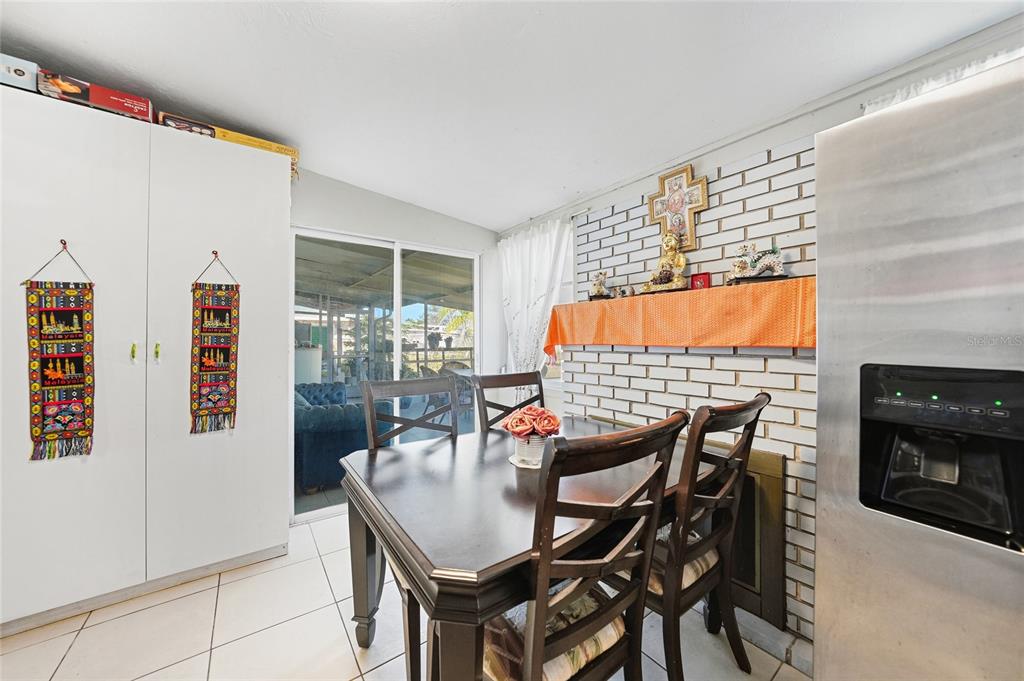 2930 Acline Road Punta Gorda, FL 33950 - Photo 8 of 29 a dining room with furniture and wooden floor