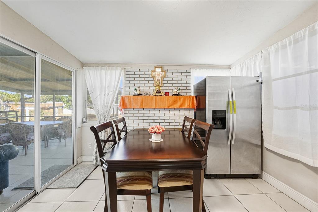 2930 Acline Road Punta Gorda, FL 33950 - Photo 9 of 29 a view of a dining room with furniture