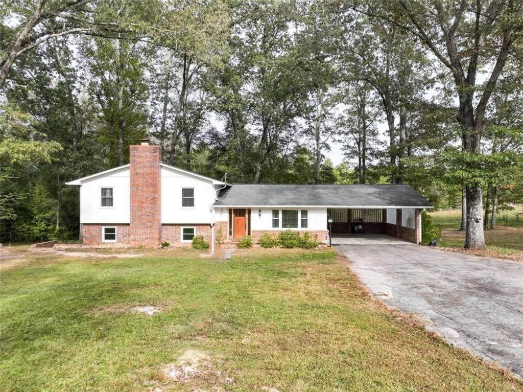 front view of a house with a yard