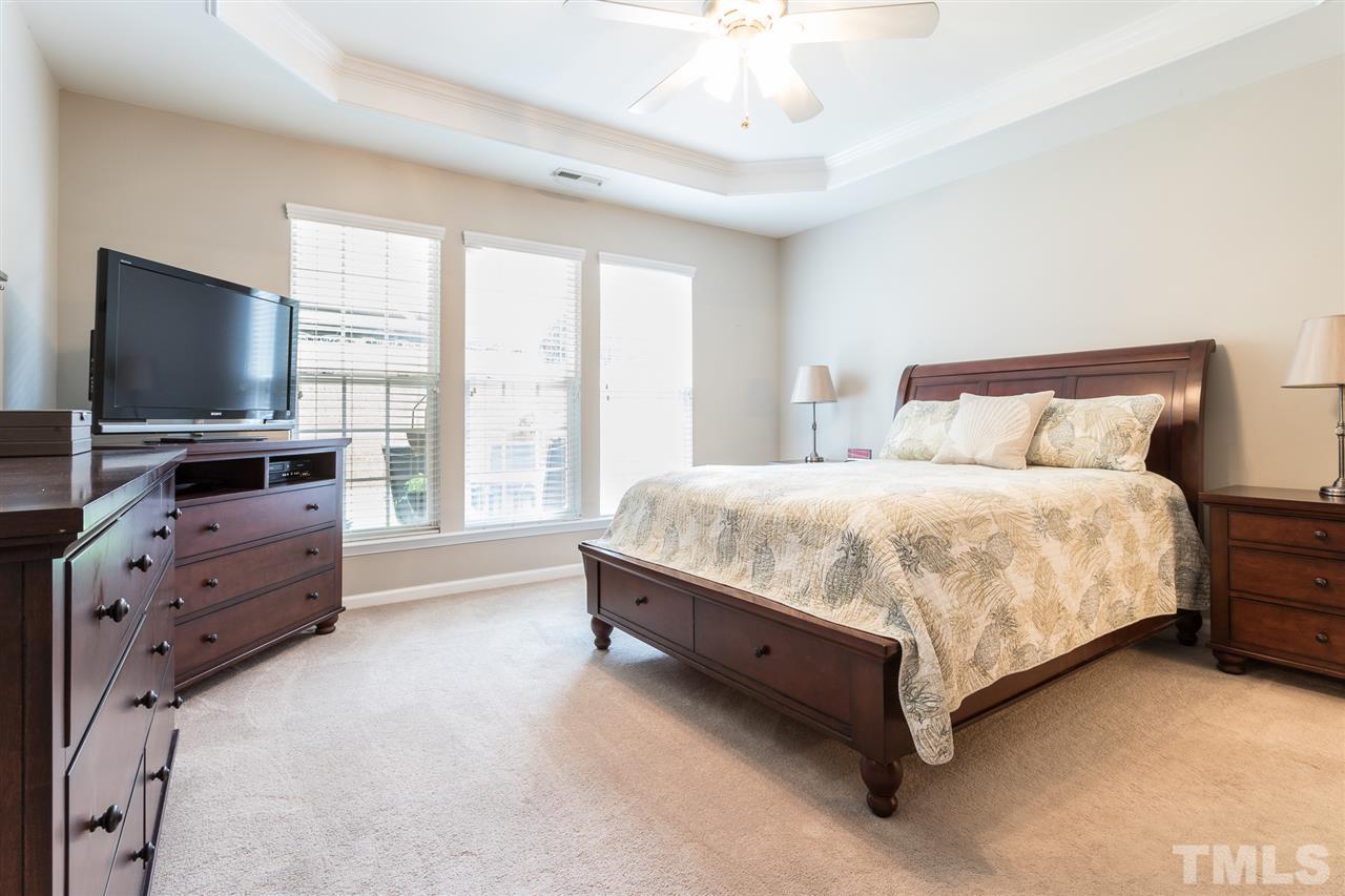 7718 Tori Trace Raleigh, NC 27613 - Photo 16 of 30 Custom blinds throughout and ceiling fans with remotes.