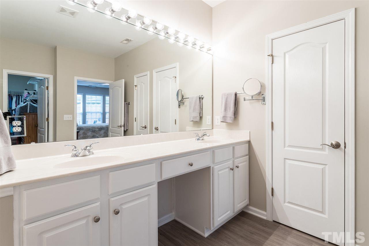 7718 Tori Trace Raleigh, NC 27613 - Photo 18 of 30 Roll out drawers under sinks