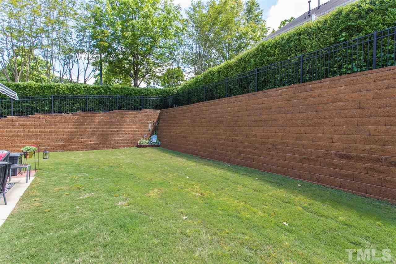 7718 Tori Trace Raleigh, NC 27613 - Photo 30 of 30 HOA maintains yard including sprinkler system.