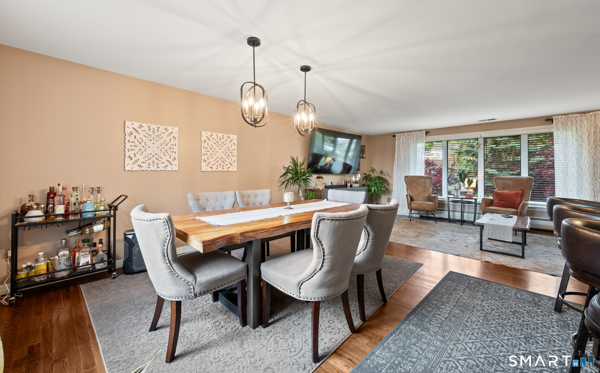 201 Ridge Crest Circle Wethersfield, CT 06109 - Photo 6 of 35 a dining room with furniture a chandelier and wooden floor