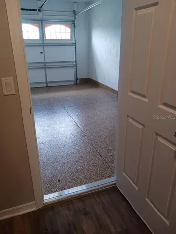 a bathroom with a sink toilet and mirror