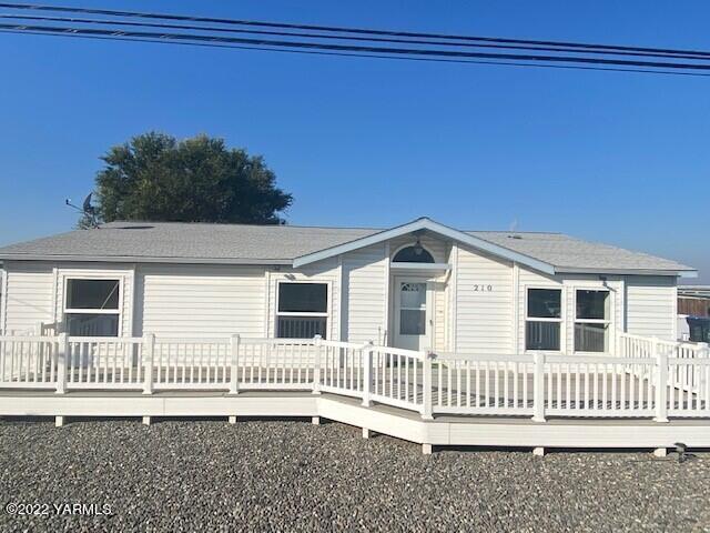 210 North Rivard Road Moxee, WA 98936 - Photo 1 of 18 a view of a house with a small yard