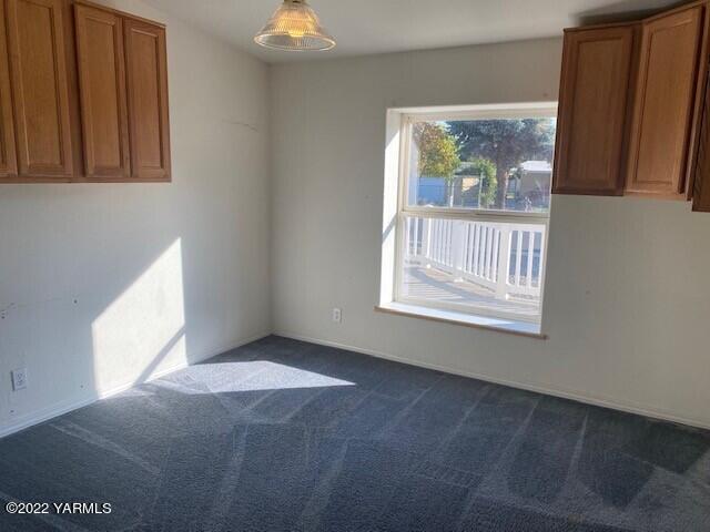 210 North Rivard Road Moxee, WA 98936 - Photo 5 of 18 a view of an empty room with a window