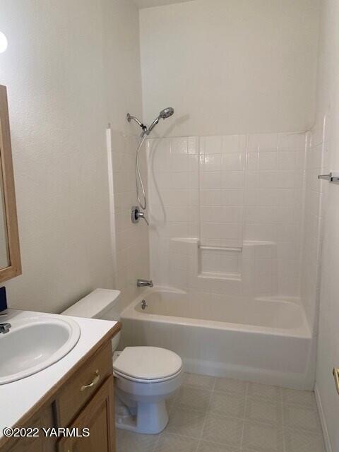 210 North Rivard Road Moxee, WA 98936 - Photo 7 of 18 a white toilet sitting next to a bath tub