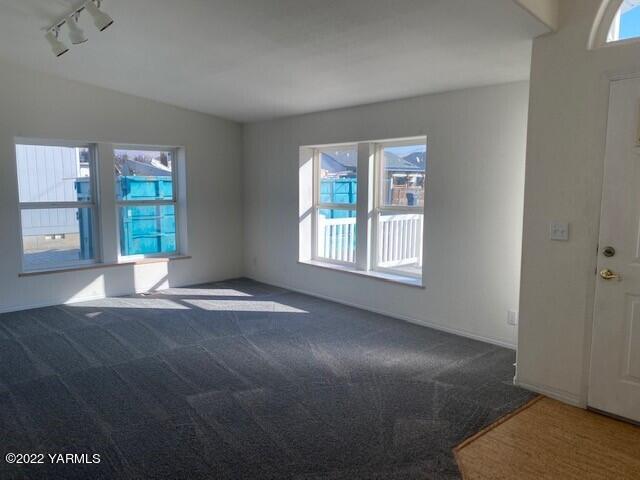 210 North Rivard Road Moxee, WA 98936 - Photo 8 of 18 an empty room with windows