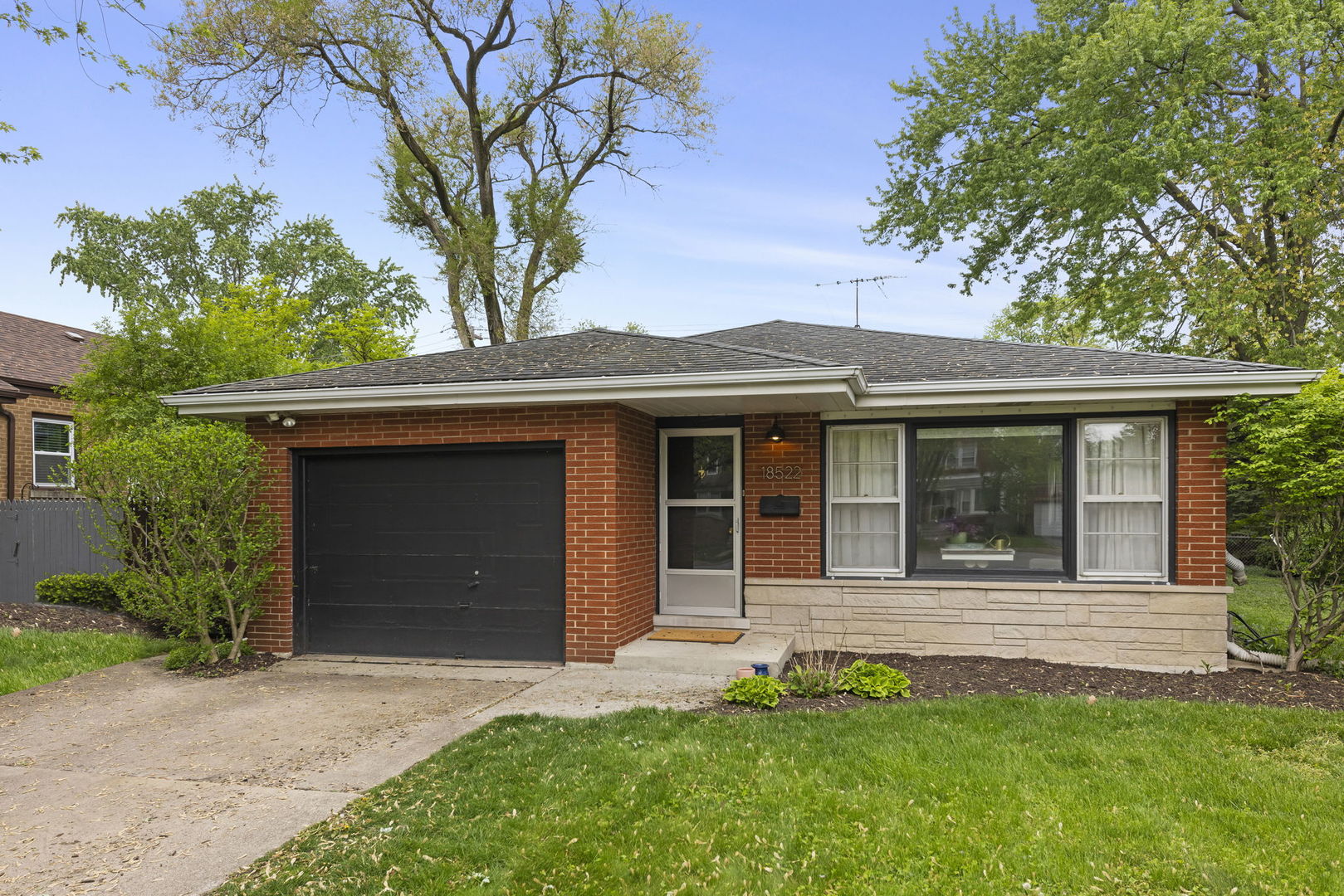 18522 Dixie Highway Homewood, IL 60430 - Photo 1 of 23 a view of a house with a small garden