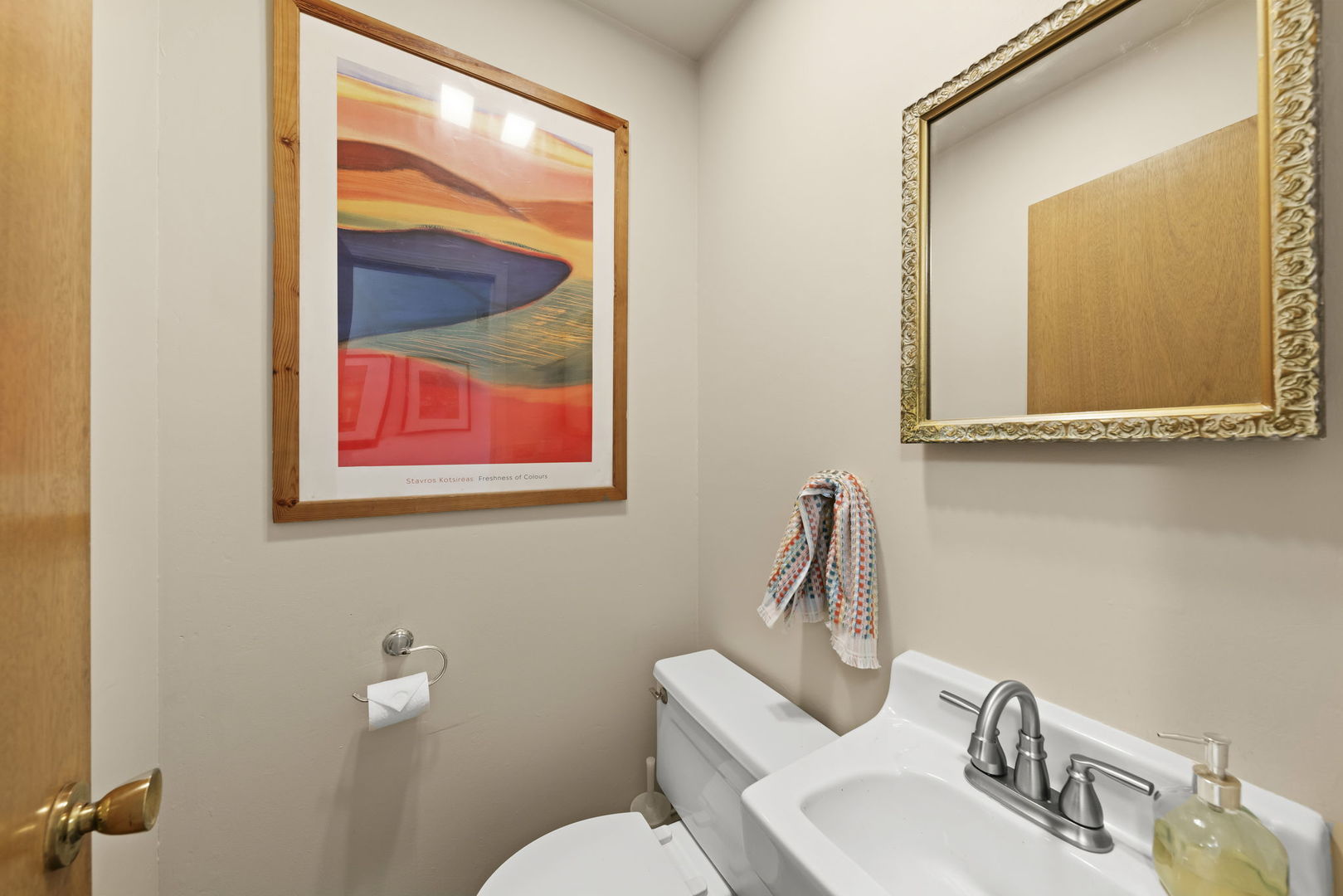 18522 Dixie Highway Homewood, IL 60430 - Photo 12 of 23 a bathroom with a toilet sink and mirror