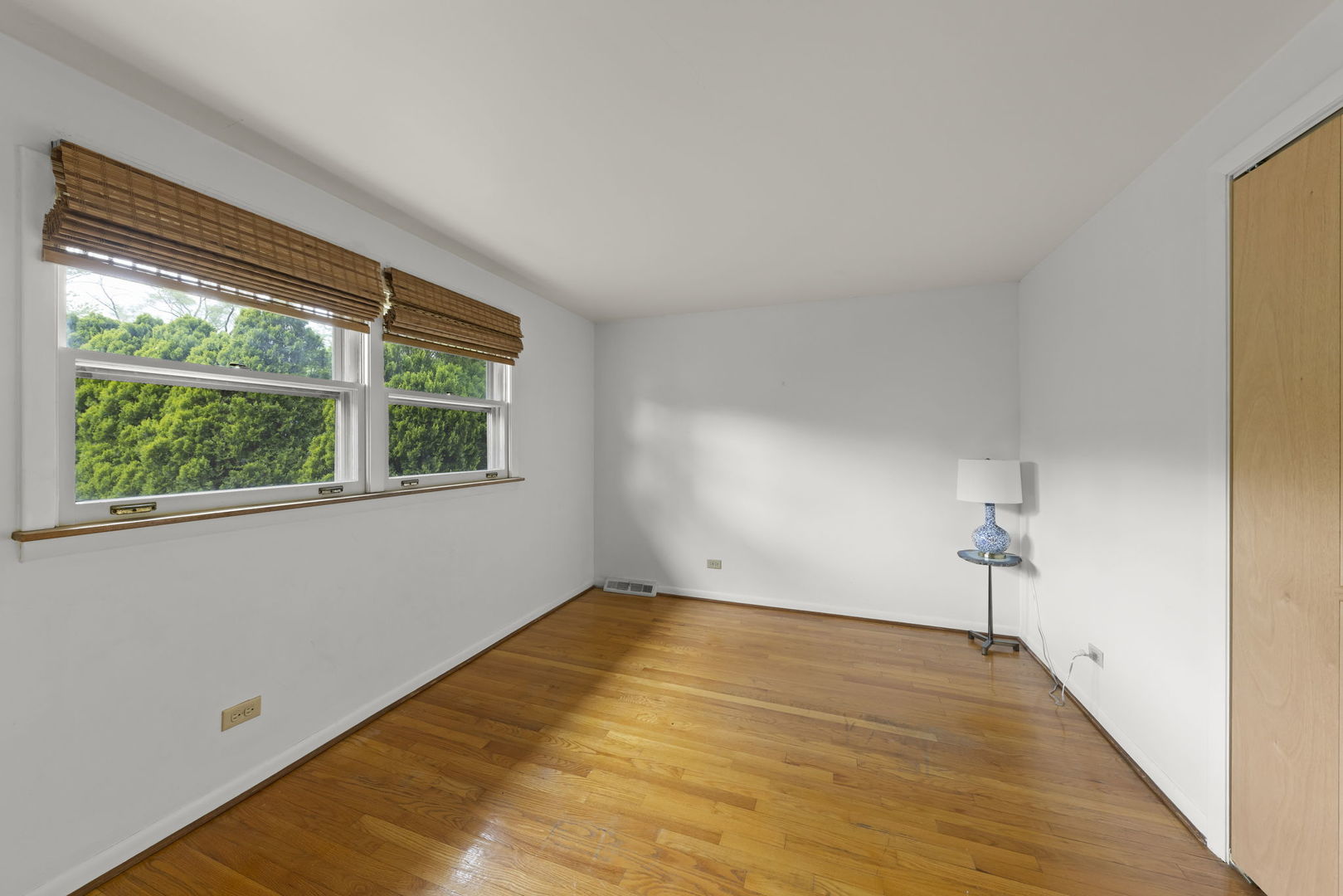 18522 Dixie Highway Homewood, IL 60430 - Photo 17 of 23 a view of empty room with wooden floor and fan