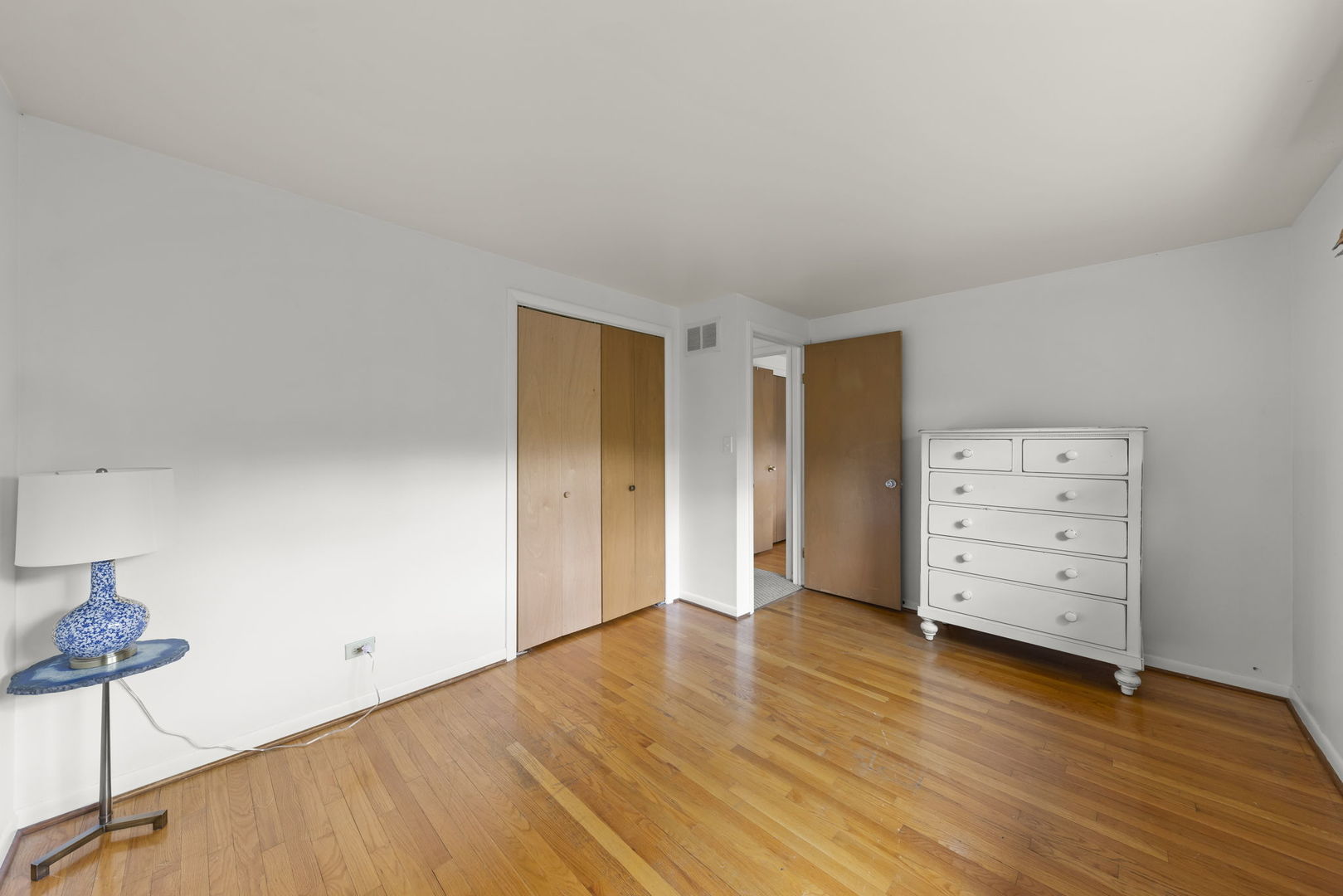 18522 Dixie Highway Homewood, IL 60430 - Photo 18 of 23 a view of an empty room with wooden floor