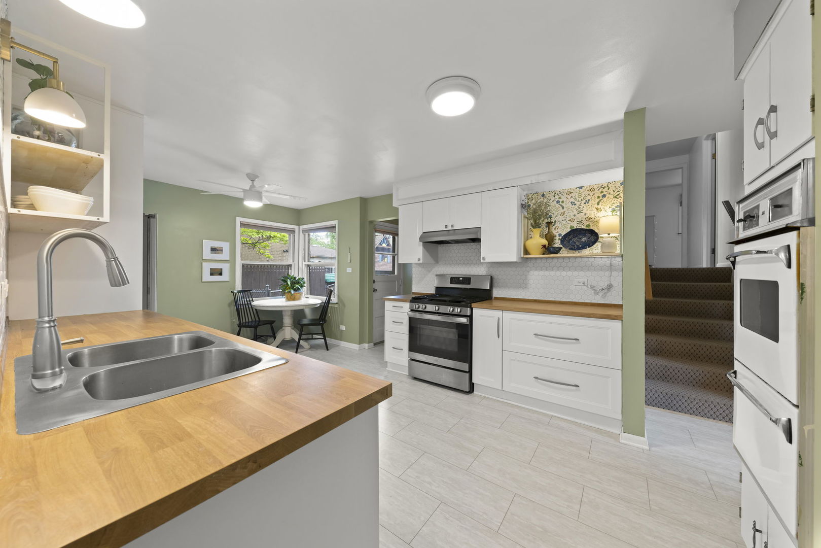 18522 Dixie Highway Homewood, IL 60430 - Photo 5 of 23 a kitchen with granite countertop a sink and appliances