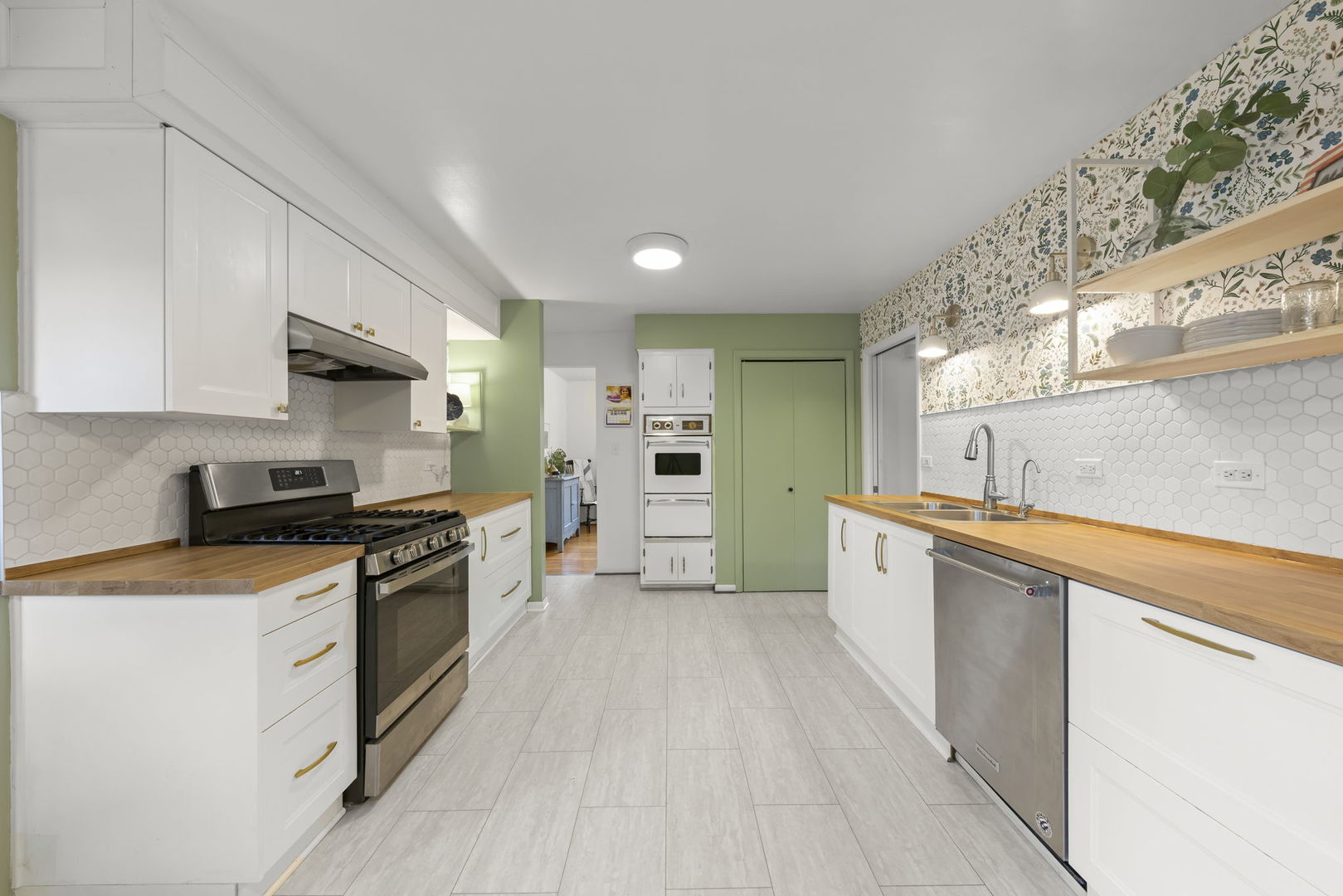 18522 Dixie Highway Homewood, IL 60430 - Photo 8 of 23 a large kitchen with stainless steel appliances granite countertop a stove a sink and a refrigerator