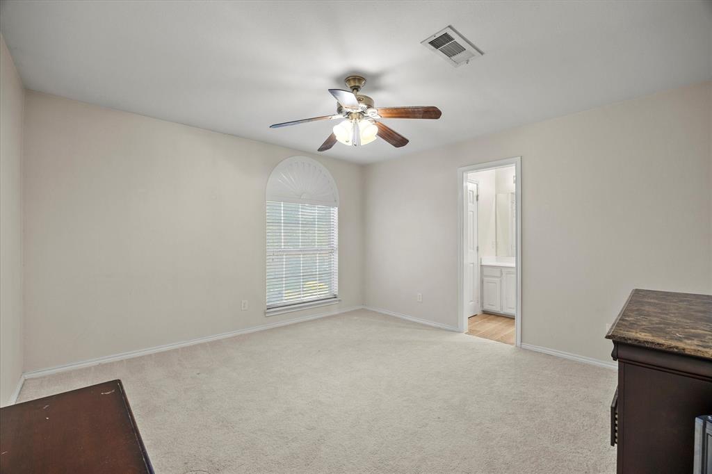 14633 Lakecrest Drive Addison, TX 75001 - Photo 12 of 14 a view of an empty room with a window
