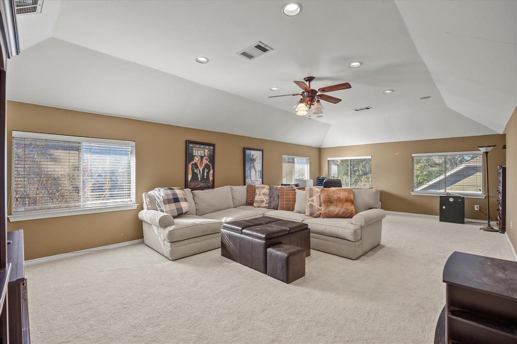 14633 Lakecrest Drive Addison, TX 75001 - Photo 9 of 14 a living room with furniture and a large window