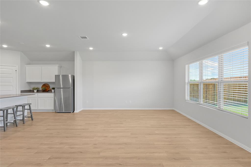 610 Ridgewood Drive Van Alstyne, TX 75495 - Photo 20 of 34 a view of kitchen with stainless steel appliances refrigerator oven and cabinets