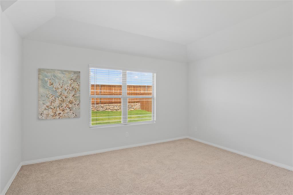 610 Ridgewood Drive Van Alstyne, TX 75495 - Photo 22 of 34 an empty room with a window