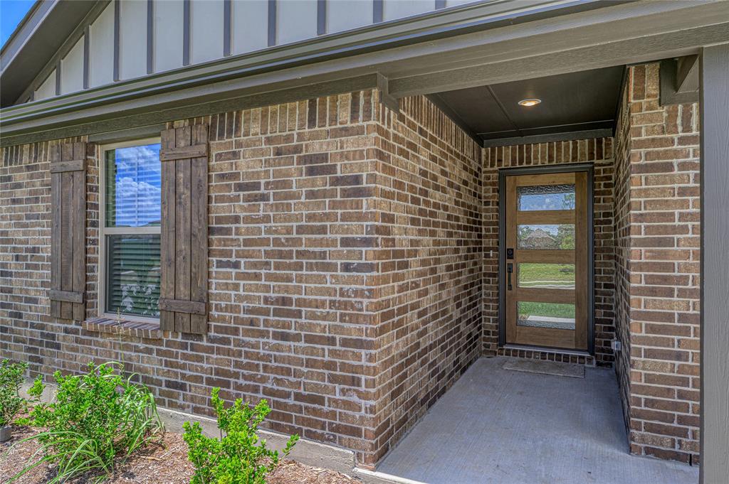 610 Ridgewood Drive Van Alstyne, TX 75495 - Photo 6 of 34 a view of door