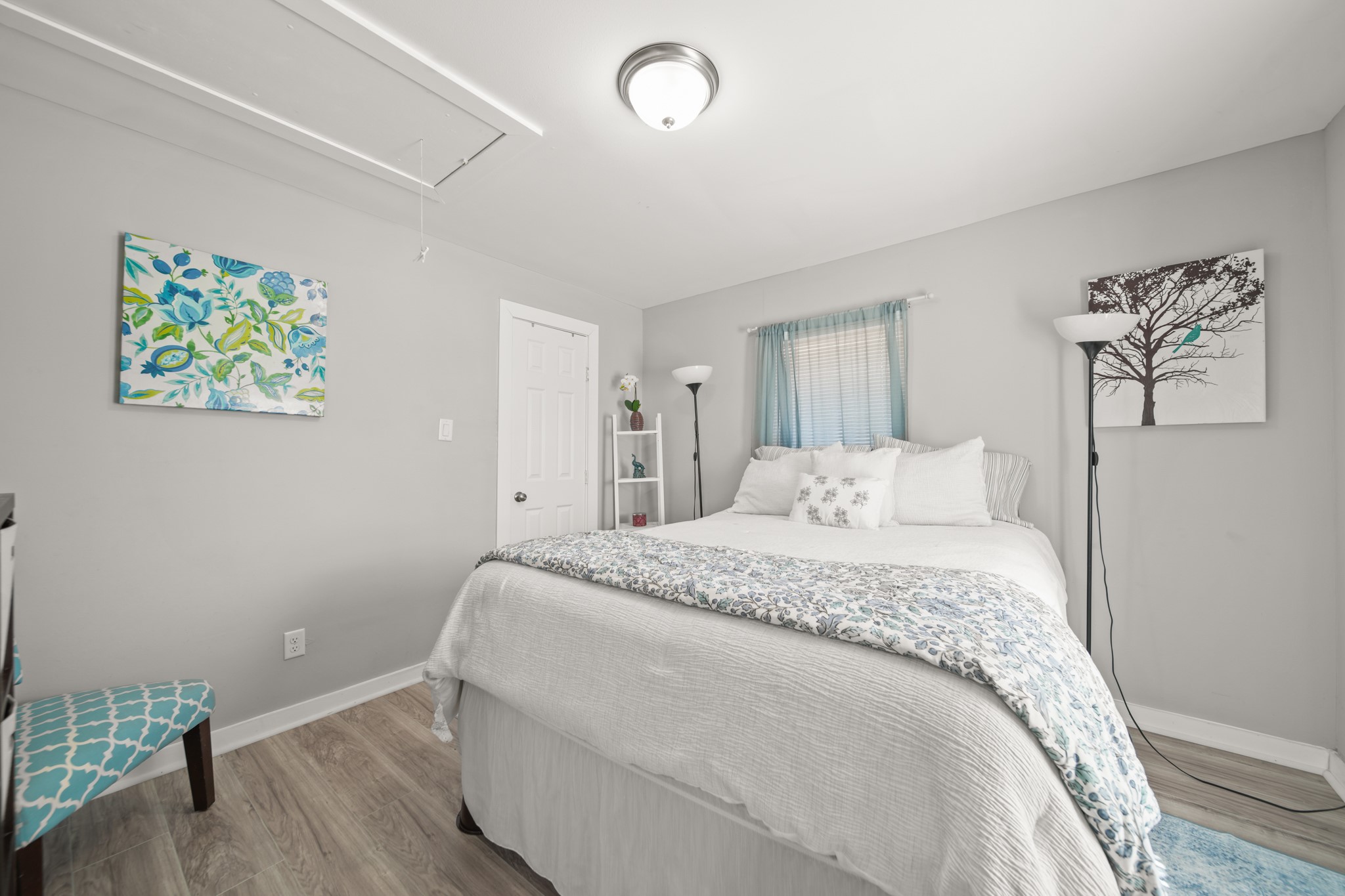 5605 Colfax Street Houston, TX 77020 - Photo 13 of 21 a spacious bedroom with a bed and a window