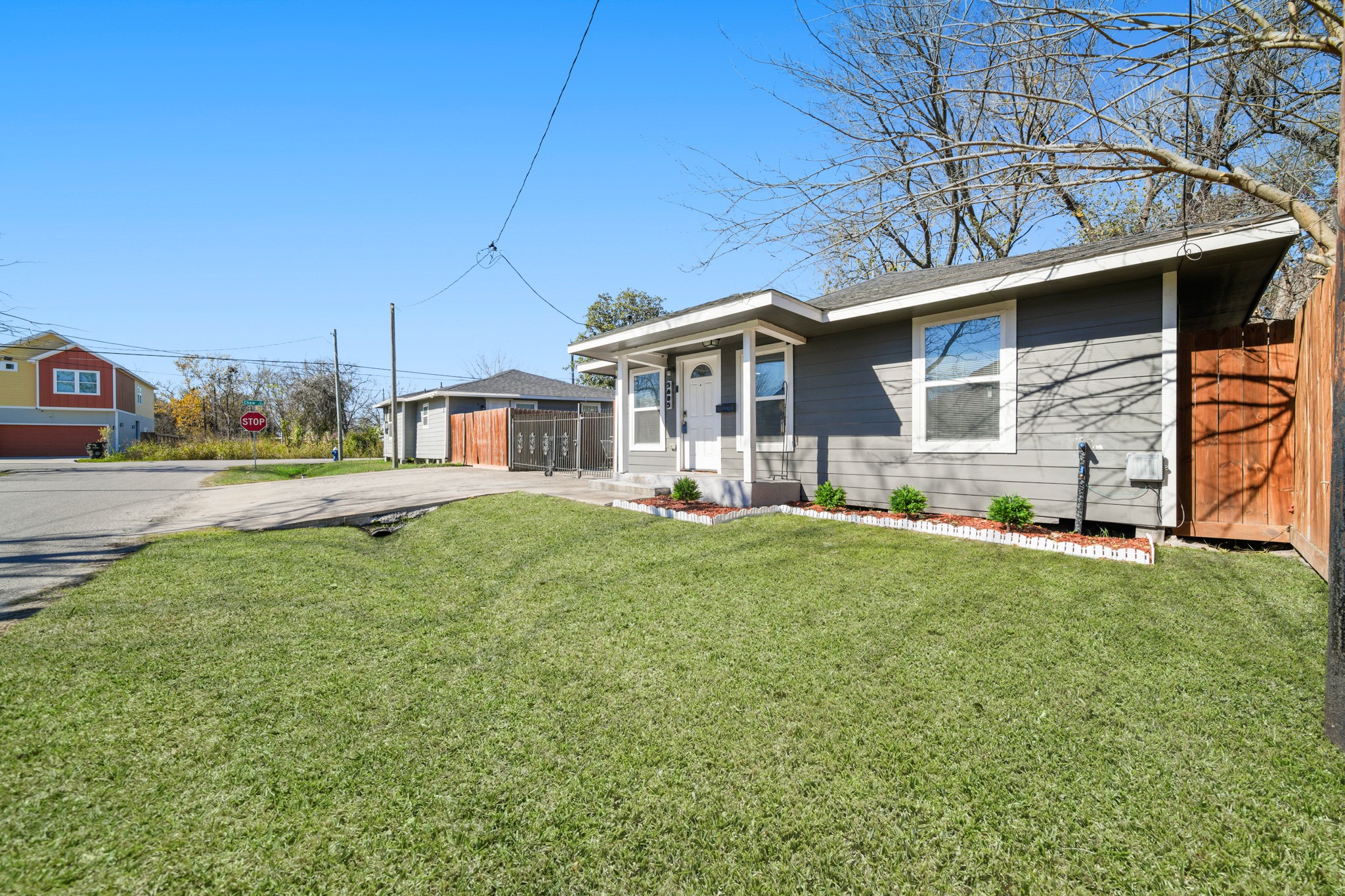 5605 Colfax Street Houston, TX 77020 - Photo 20 of 21 a view of a house with a yard and plants
