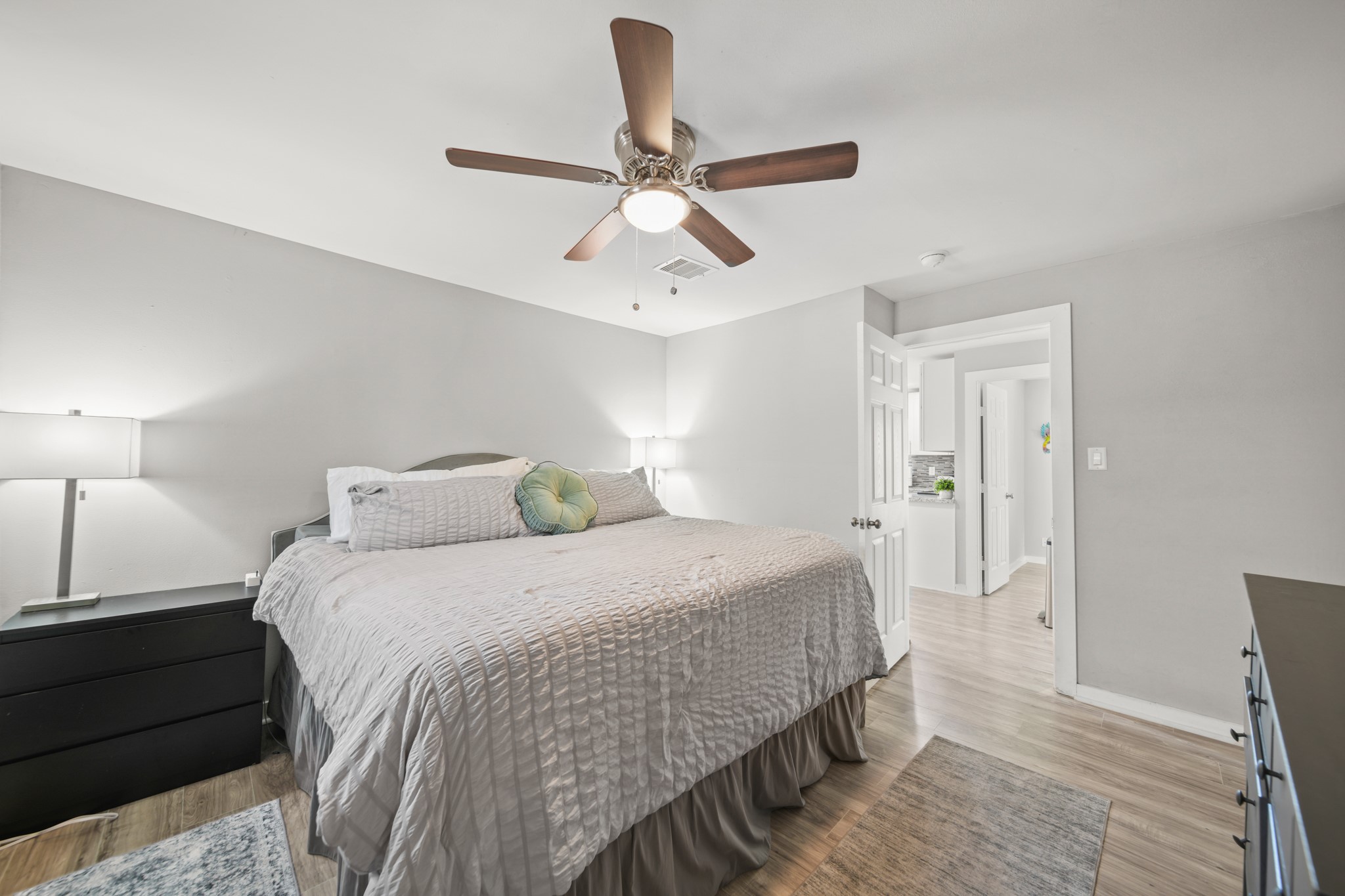 5605 Colfax Street Houston, TX 77020 - Photo 8 of 21 a bedroom with bed and window