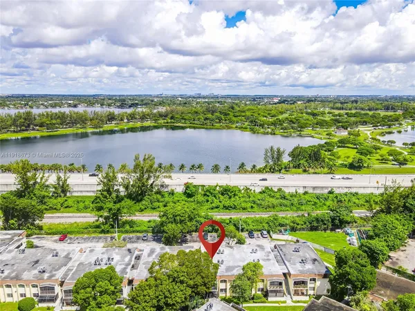 a view of a lake with a city