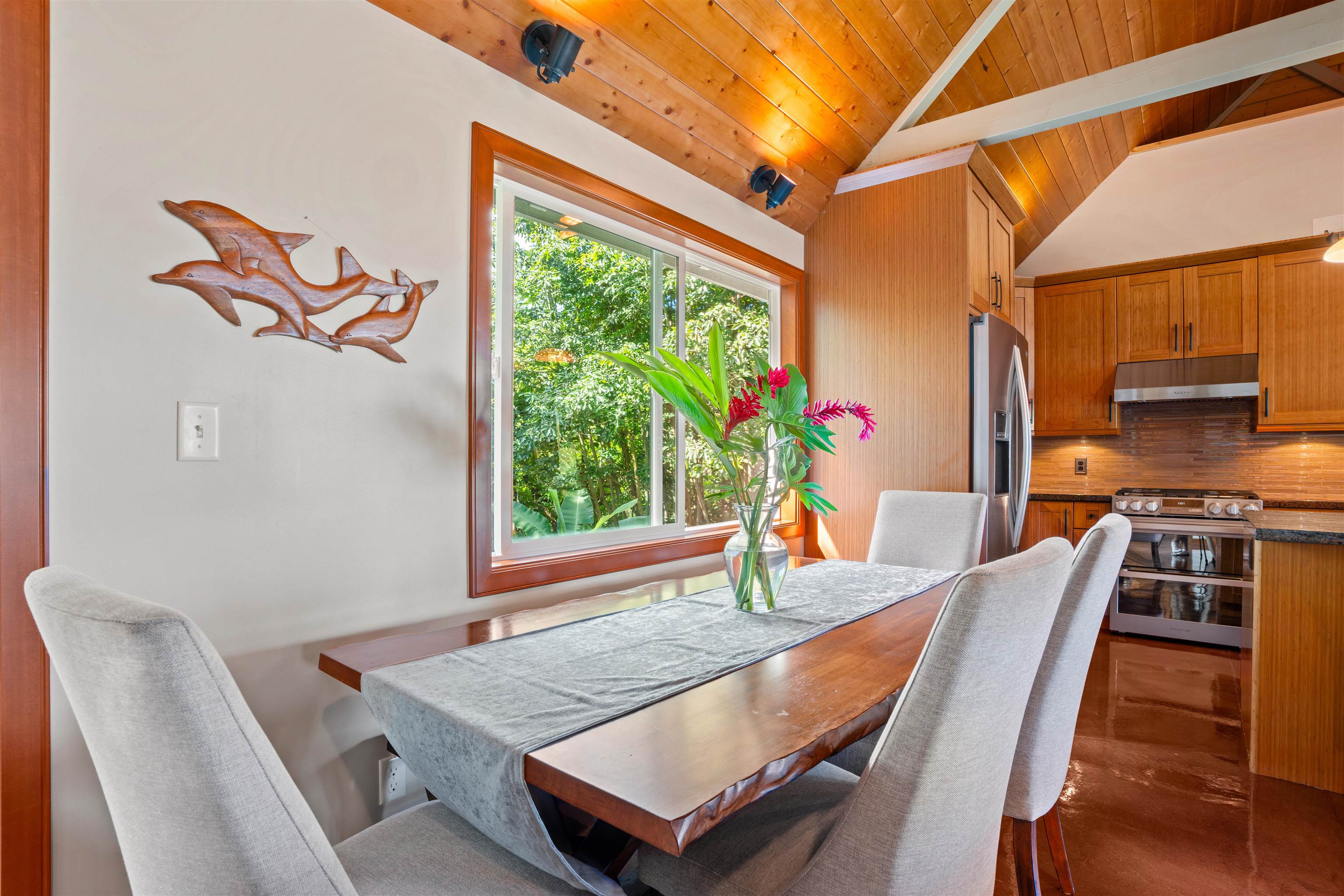 655 Kulike Road, Unit B Haiku, HI 96708 - Photo 17 of 38 a dining room with furniture and a window