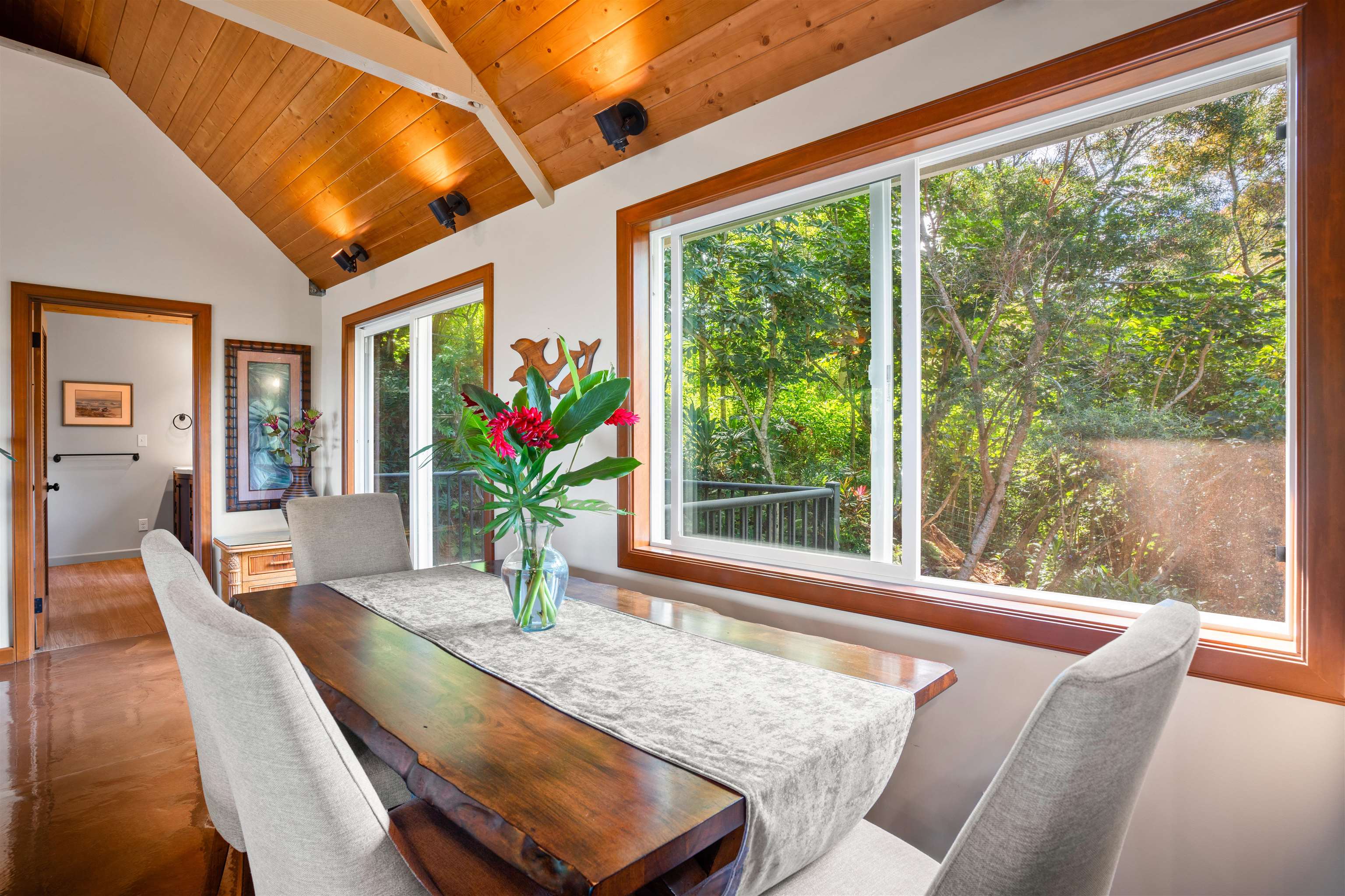 655 Kulike Road, Unit B Haiku, HI 96708 - Photo 18 of 38 a living room with furniture and floor to ceiling windows