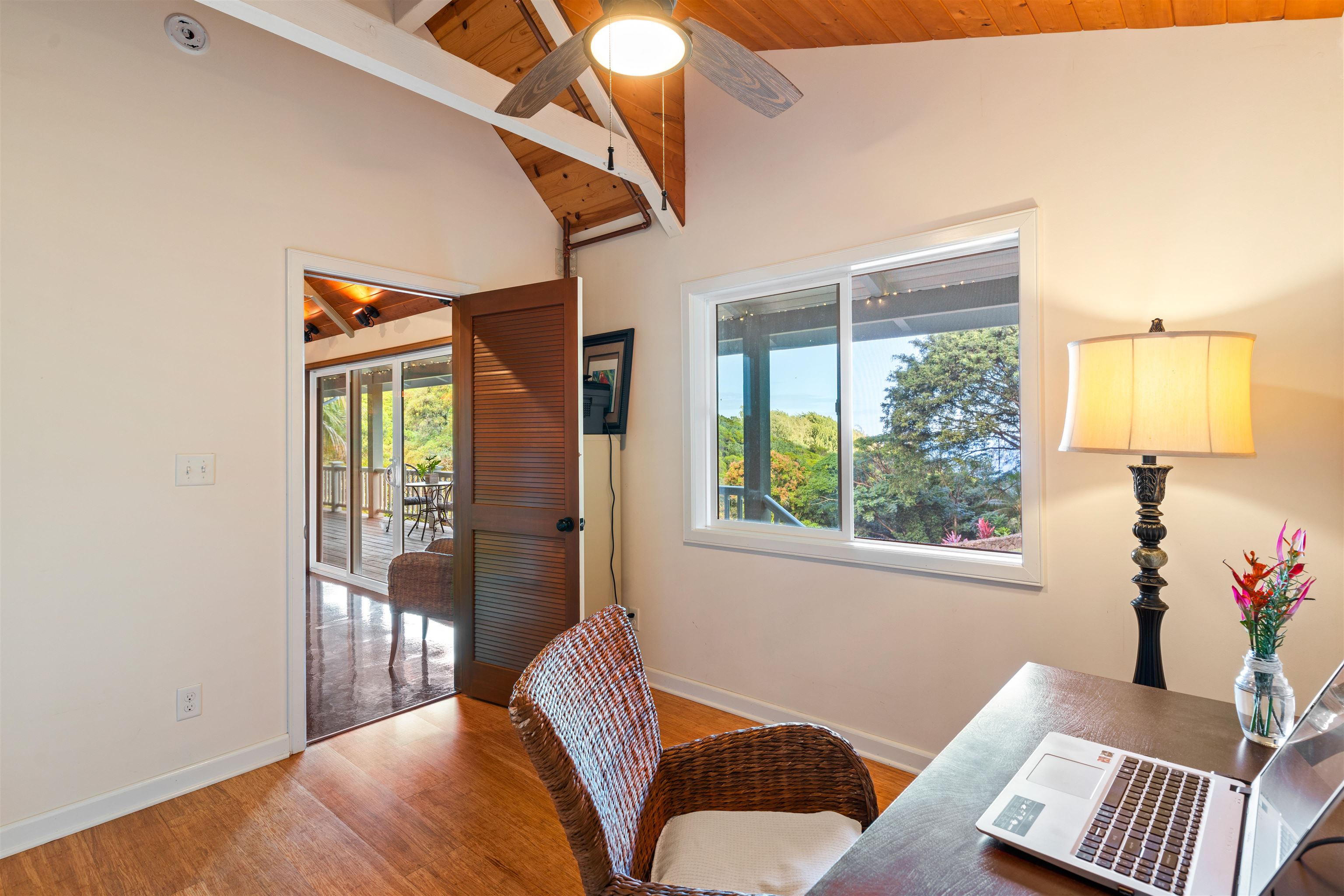655 Kulike Road, Unit B Haiku, HI 96708 - Photo 25 of 38 a living room with furniture and a window