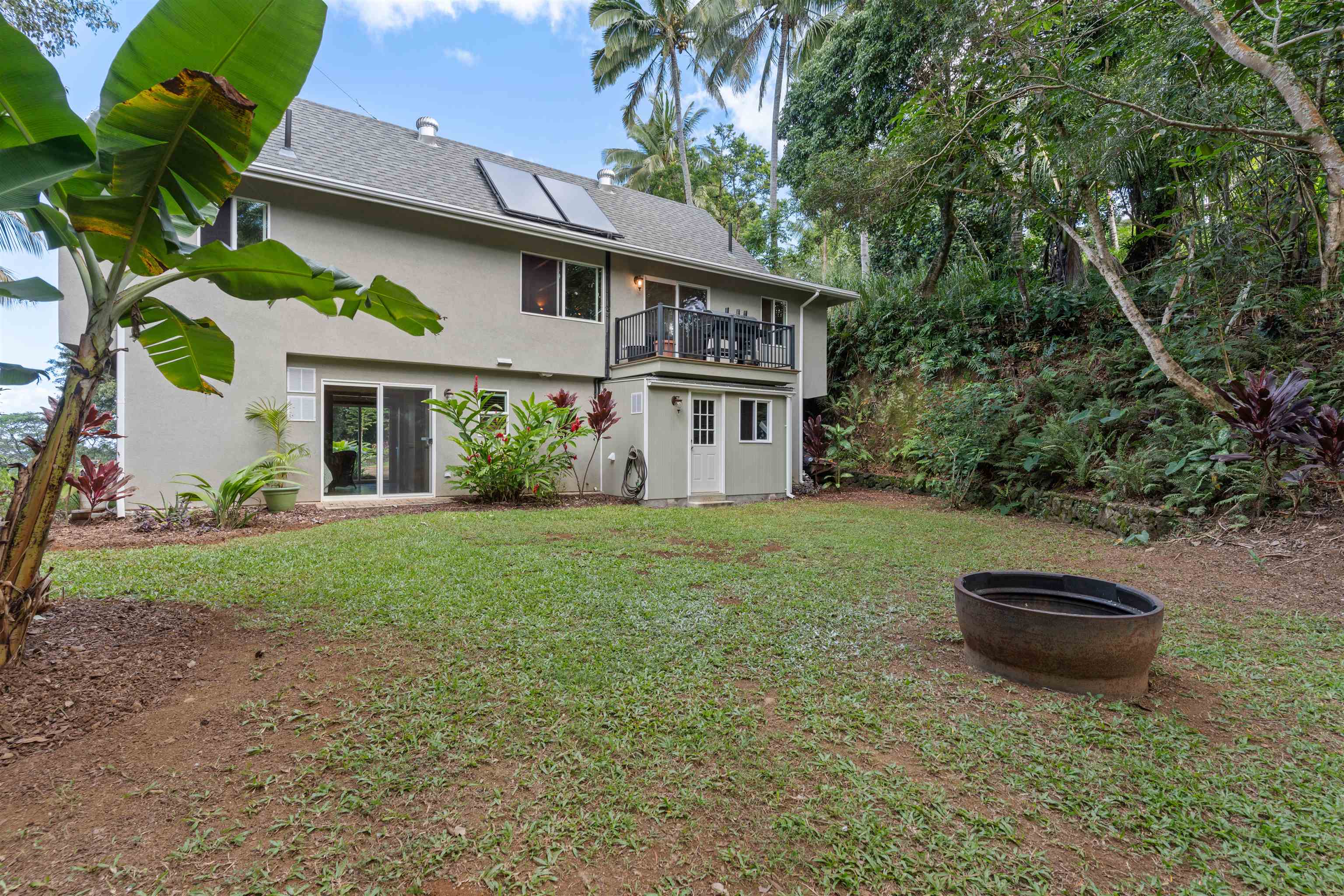 655 Kulike Road, Unit B Haiku, HI 96708 - Photo 34 of 38 a house view with a garden space