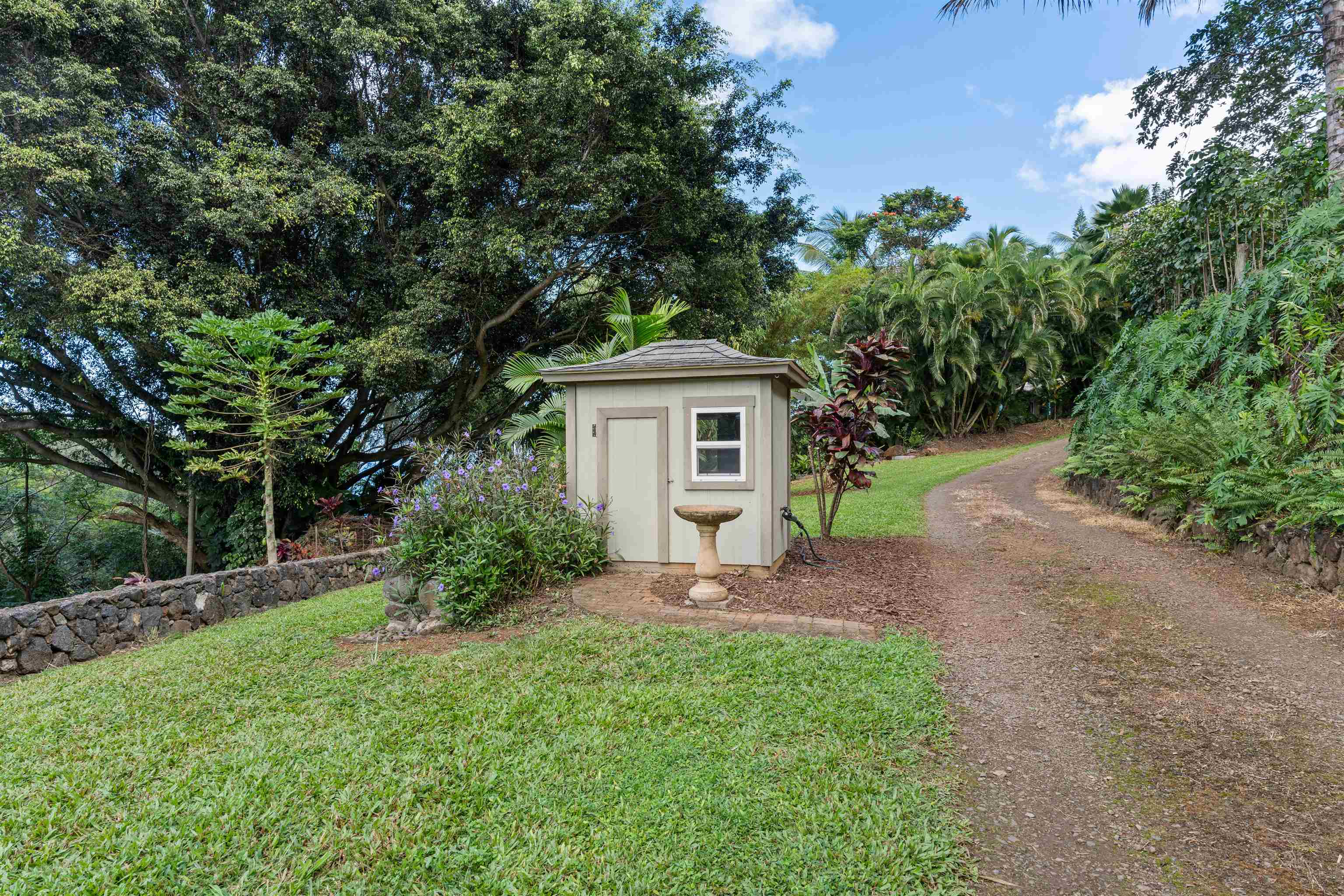 655 Kulike Road, Unit B Haiku, HI 96708 - Photo 37 of 38 a front view of a house with garden