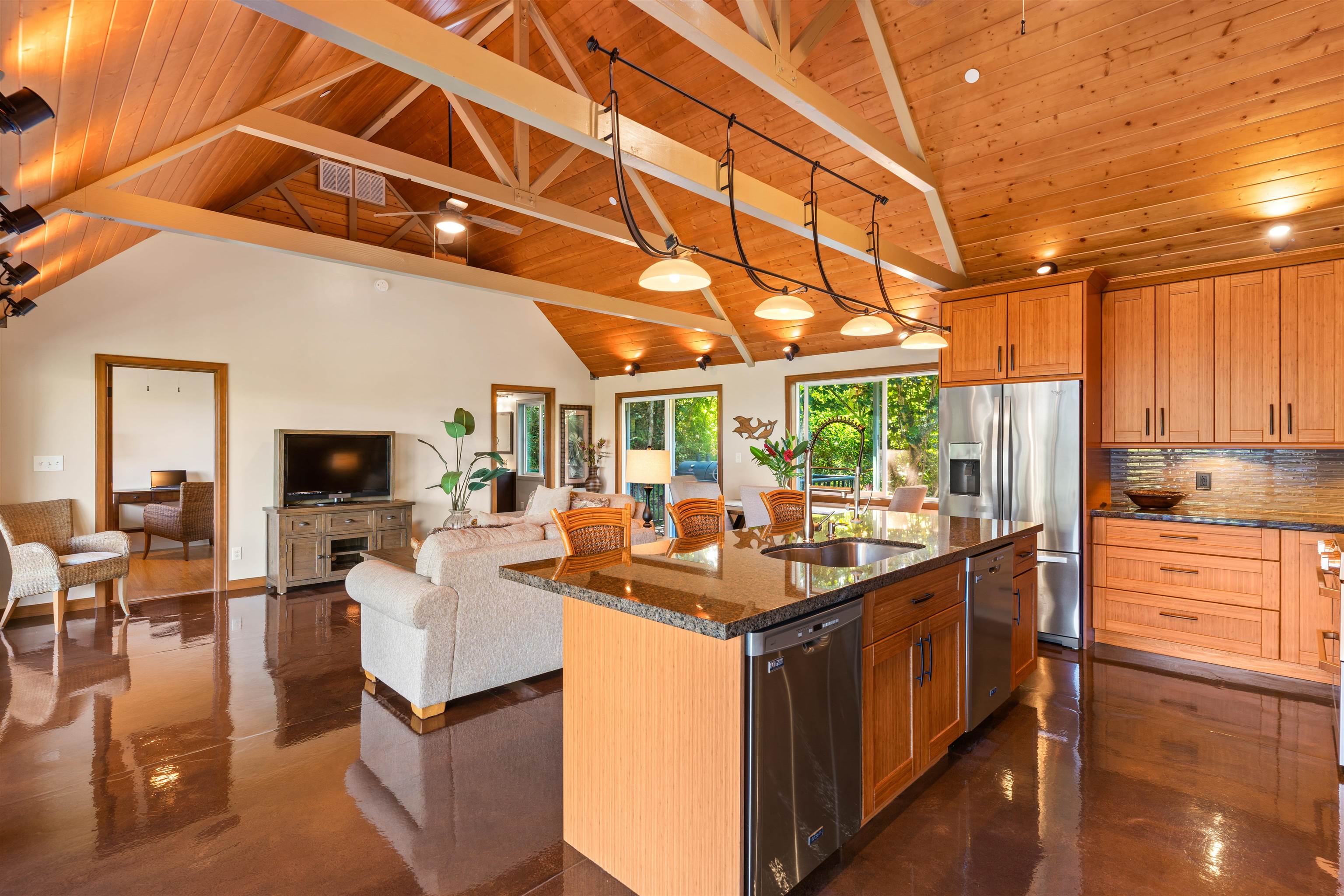 655 Kulike Road, Unit B Haiku, HI 96708 - Photo 7 of 38 a room with stainless steel appliances kitchen island granite countertop a sink and cabinets
