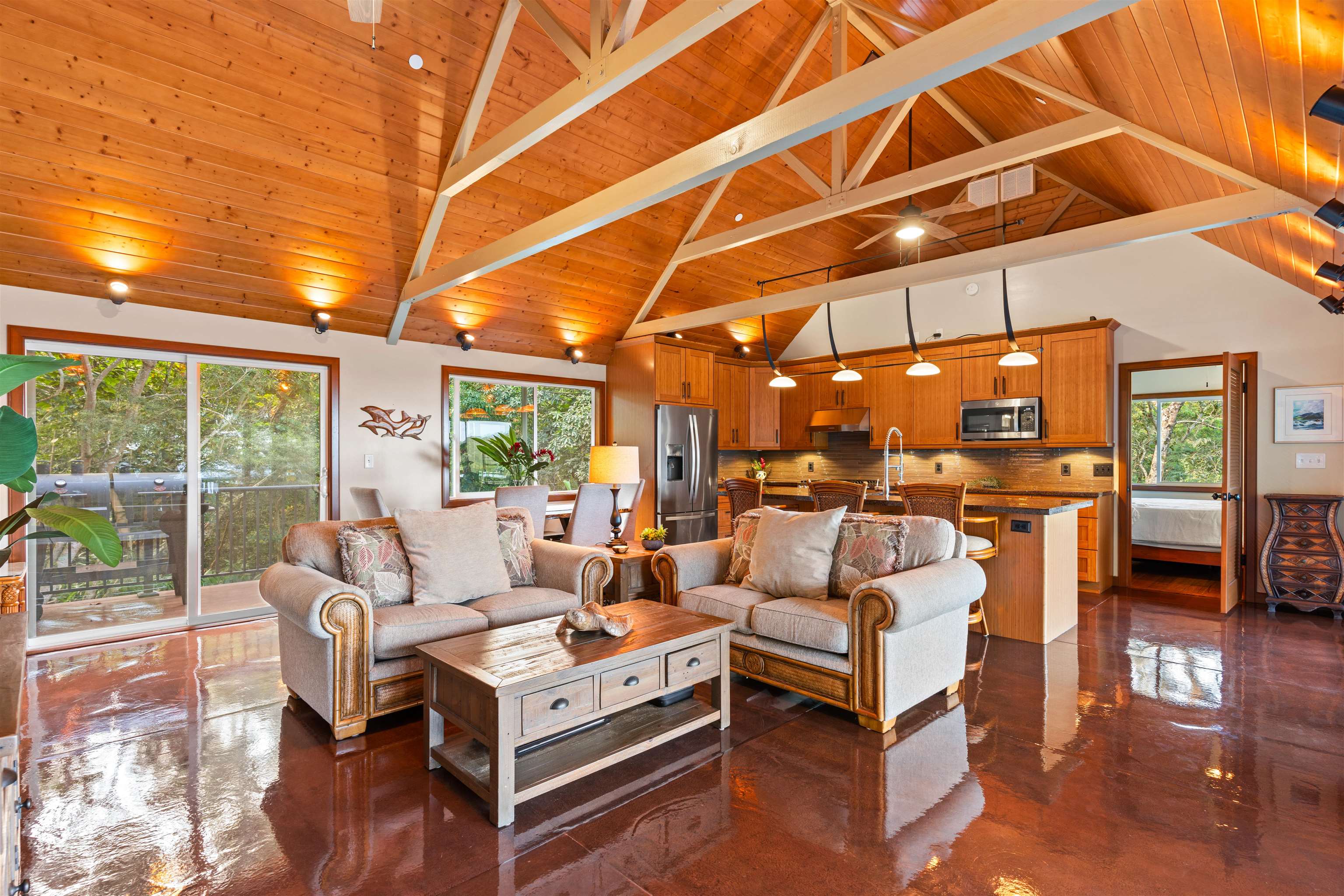 655 Kulike Road, Unit B Haiku, HI 96708 - Photo 9 of 38 a building outdoor space with patio furniture and potted plants