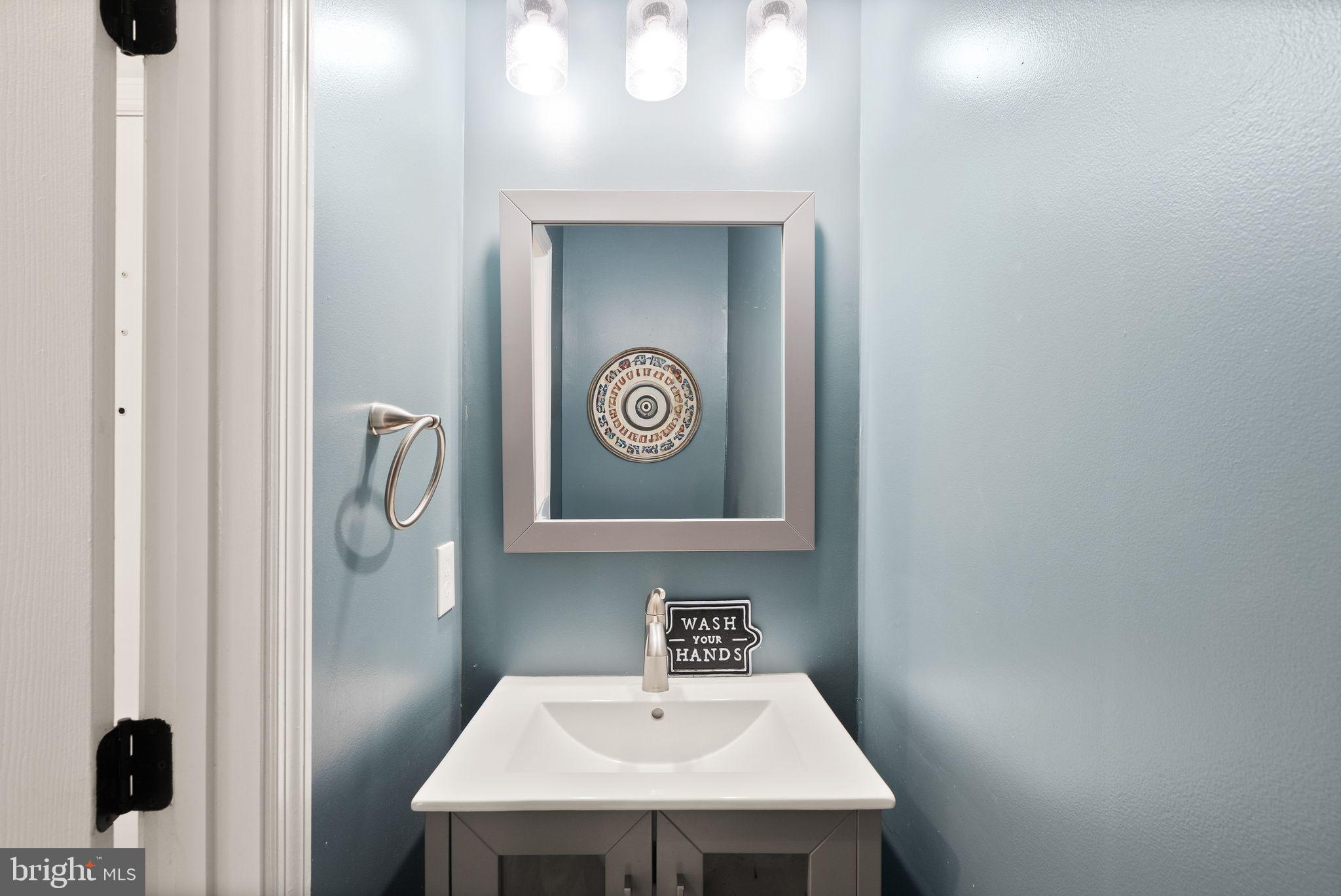 6020 Kestner Circle Alexandria, VA 22315 - Photo 11 of 59 a bathroom with a sink and a mirror