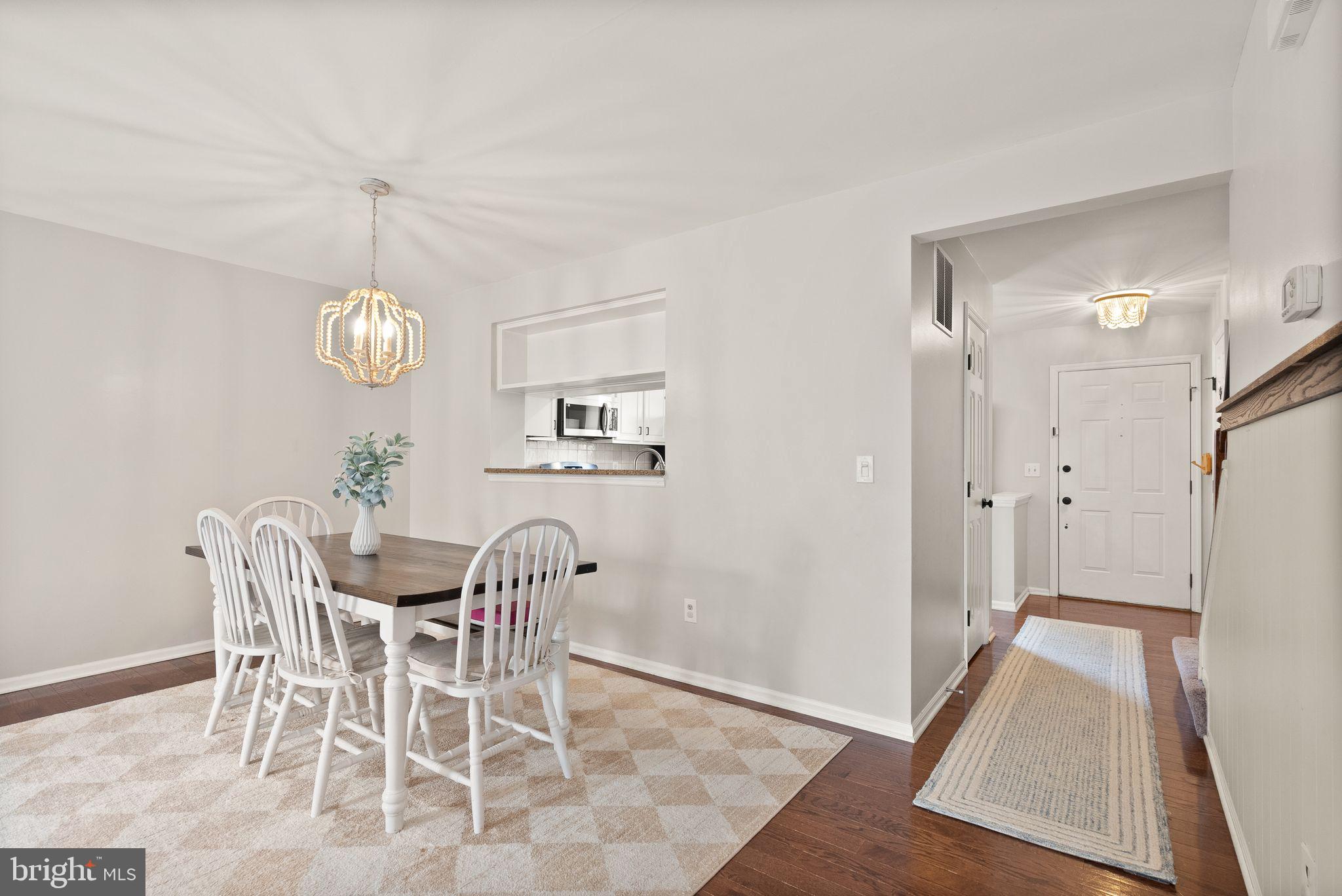6020 Kestner Circle Alexandria, VA 22315 - Photo 12 of 59 a view of a dining room with furniture and wooden floor