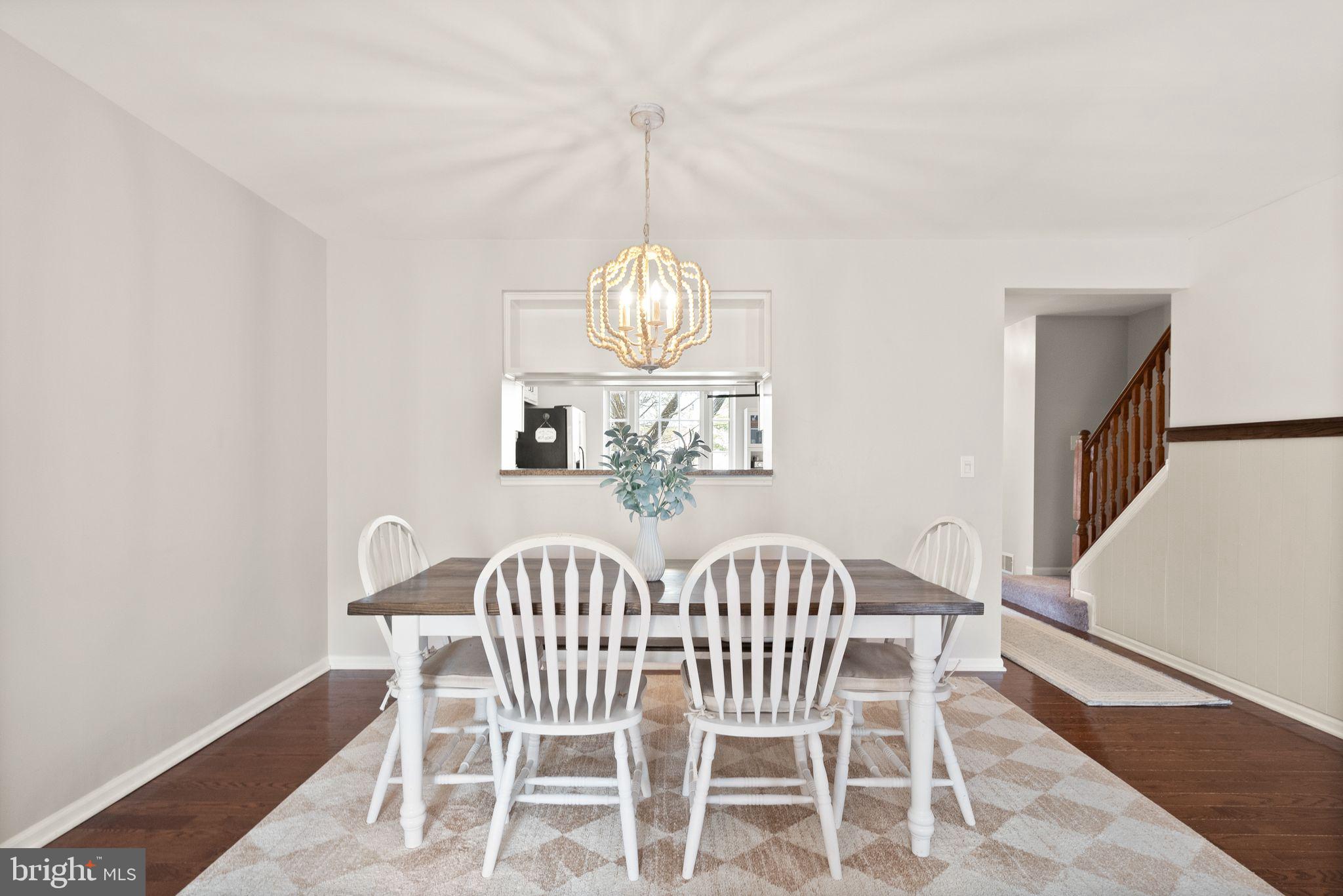 6020 Kestner Circle Alexandria, VA 22315 - Photo 13 of 59 a view of a dining room with furniture and wooden floor