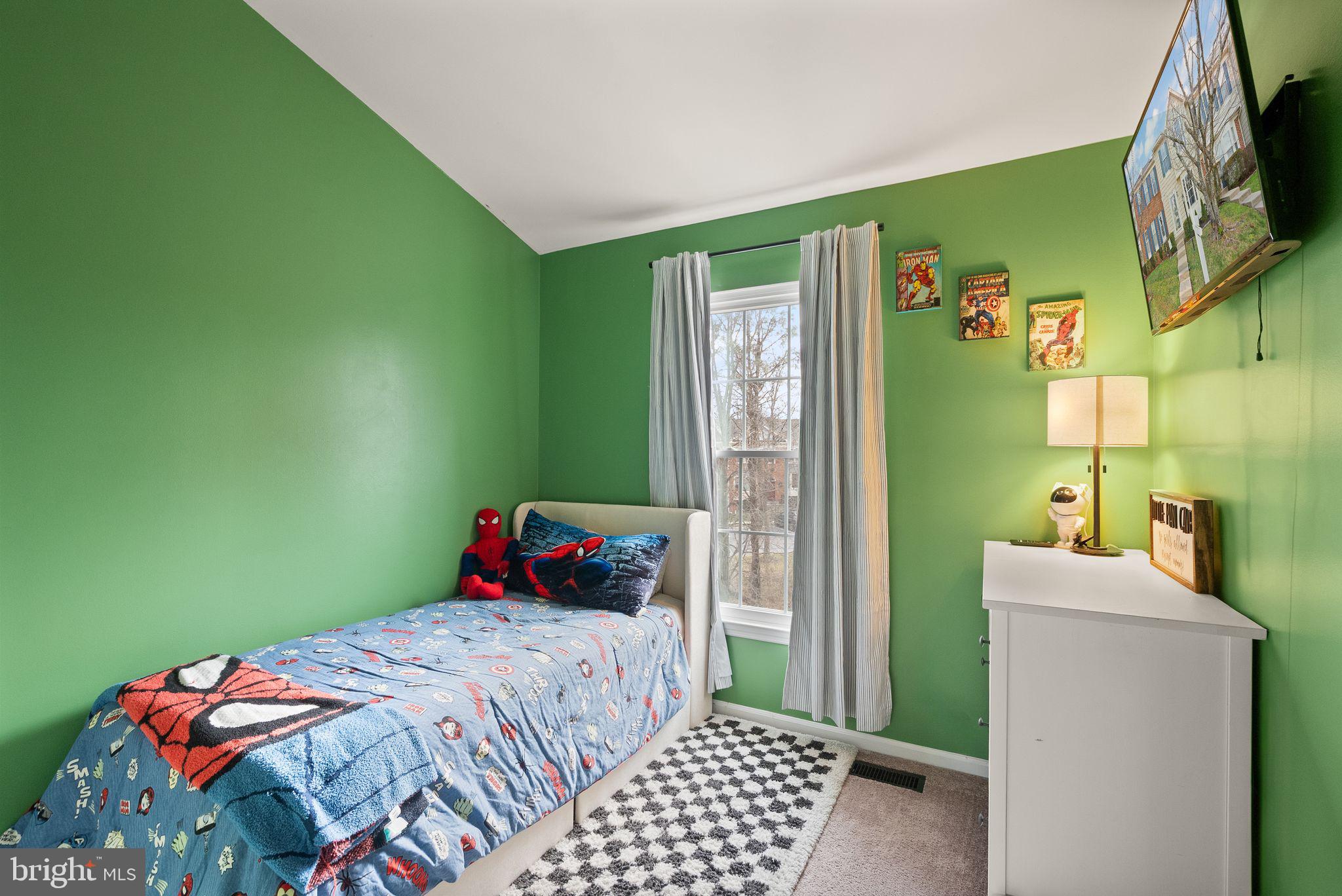 6020 Kestner Circle Alexandria, VA 22315 - Photo 26 of 59 a bedroom with a bed and a tv