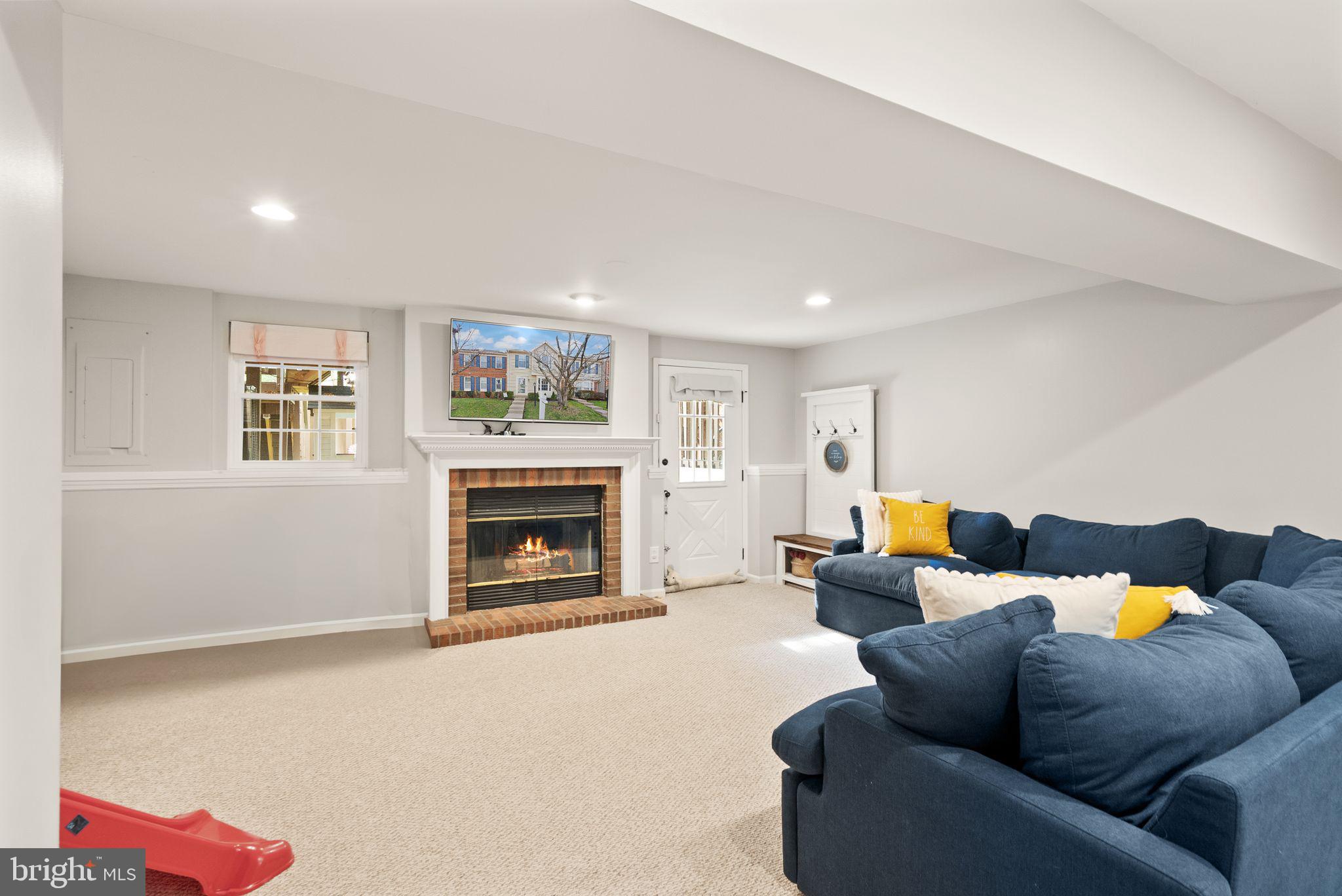 6020 Kestner Circle Alexandria, VA 22315 - Photo 32 of 59 a living room with furniture fireplace and a window